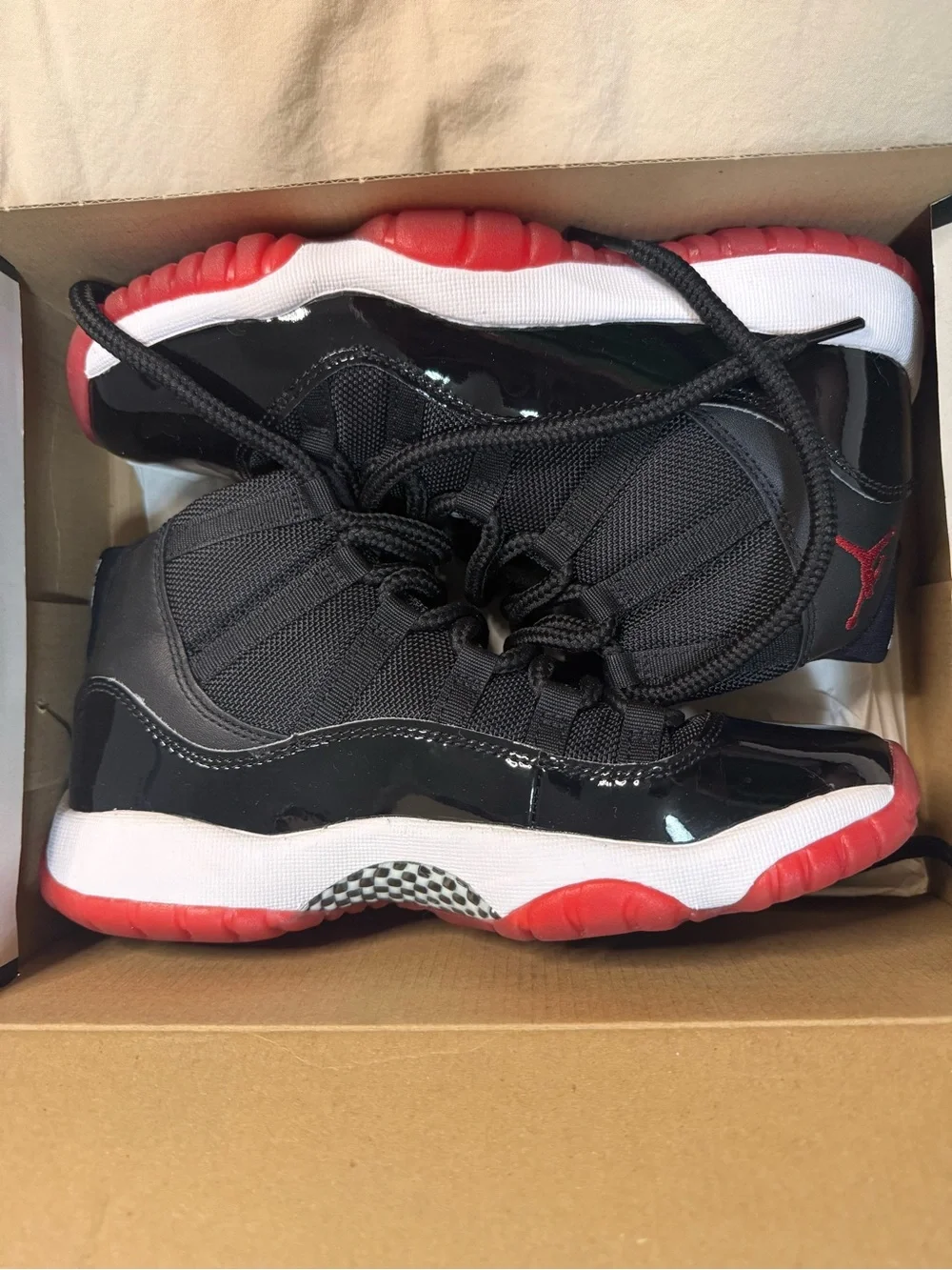 Jordan womans Black and Red High-Top Sneakers